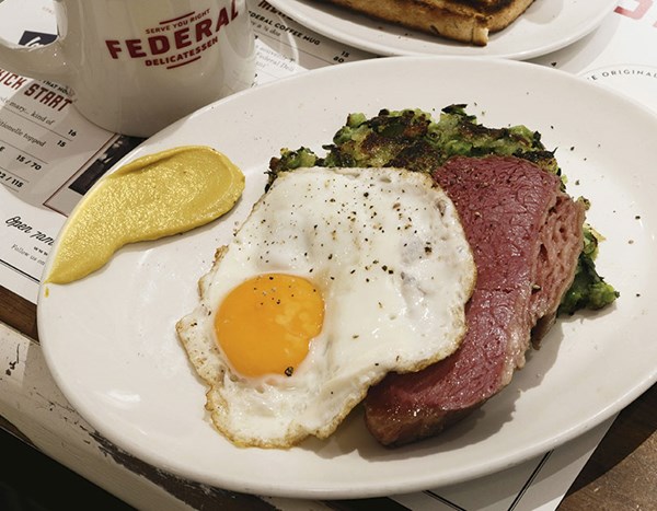 Corned beef with pea hash & fried egg