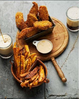 Cornflake-crusted chicken fingers with rosemary-sweet potato pan fries and chutney dipping sauce