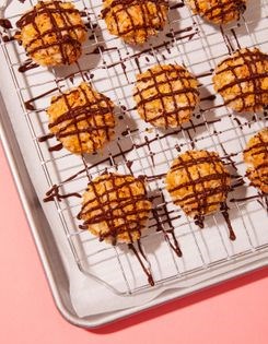 Cornflake macaroons with chocolate drizzle