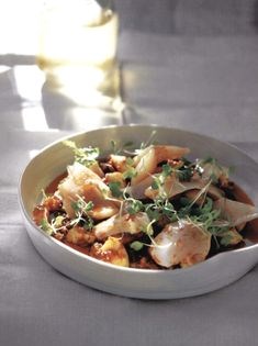 Cornish pollock, potato gnocchi, warm tomato and anchovy vinaigrette