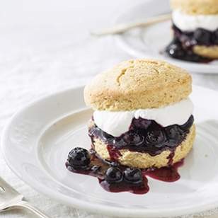 Cornmeal-blueberry shortcakes with honey whipped cream