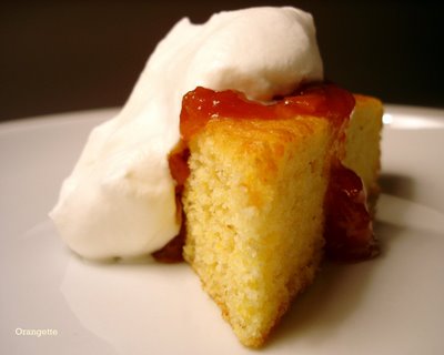Cornmeal cake with warm apricot jam and whipped cream	     