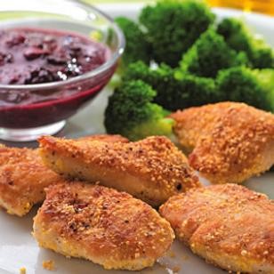 Cornmeal-crusted chicken nuggets with blackberry mustard