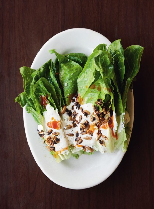 Cos lettuce with Depot ranch dressing, hot sauce and sweet spiced sunflower seeds