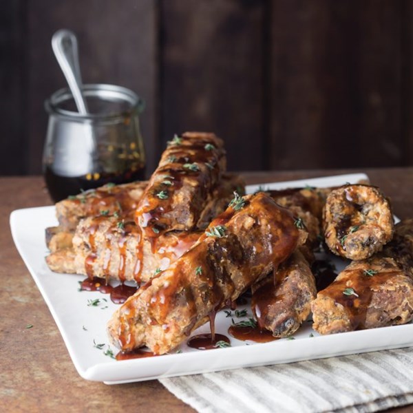 Country-fried St. Louis ribs with spicy cane syrup drizzle