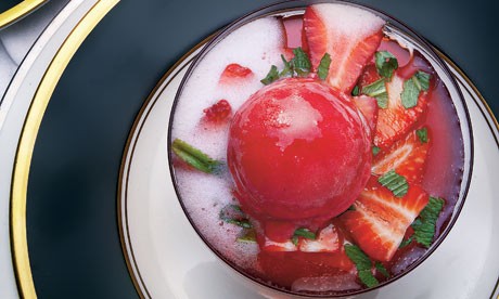 Coupe of strawberries on elderflower jelly with sorbet and Champagne