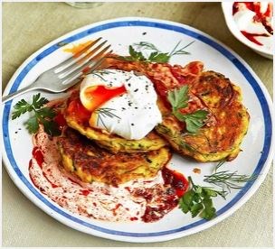 Courgette & ricotta fritters with poached eggs & harissa yogurt