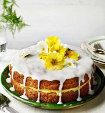 Courgette and lemon drizzle cake with crystallised primroses