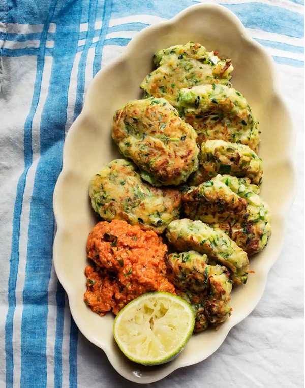 Courgette cakes with red pepper sauce