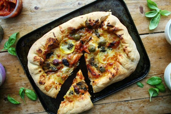 Courgette, mushroom and olive pizza