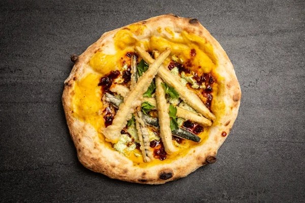 Courgette pizza with herby goat’s cheese and chipotle chutney