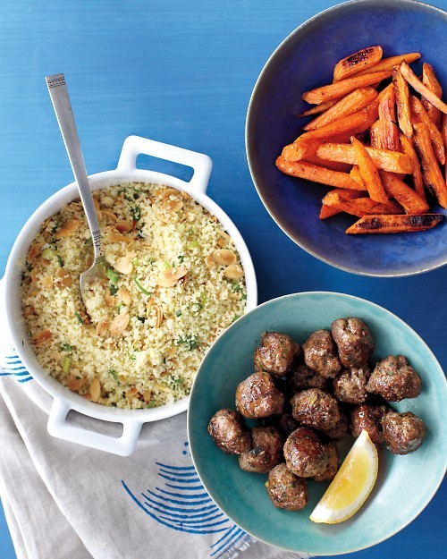 Couscous and roasted carrots with spiced meatballs