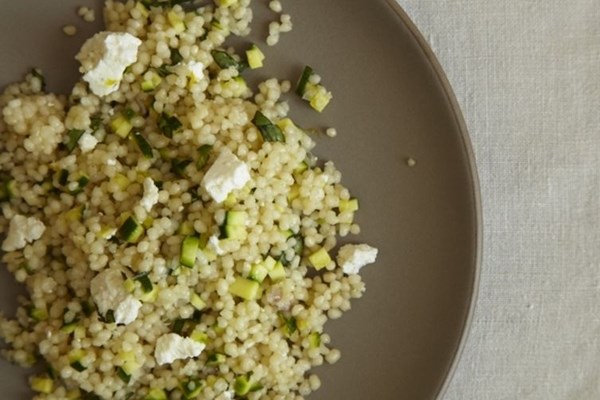 Couscous salad with zucchini, lemon and ricotta salata