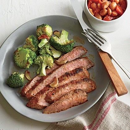Cowboy flank steak with sweet and smoky beans