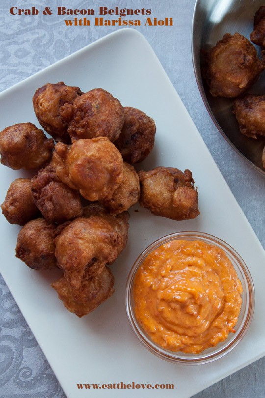 Crab & bacon beignets with harissa aioli
