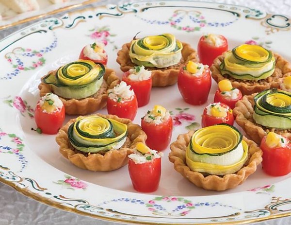 Crab and corn-stuffed cherry tomatoes