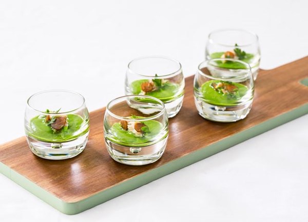 Crab and lovage soup with pickled kohlrabi