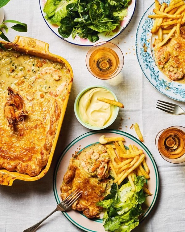 Crab and prawn pot pies with chips and salad