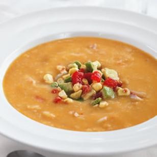 Crab bisque with avocado, tomato & corn relish