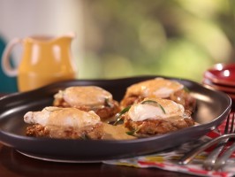 Crab cakes Benedict with "Old Bay" Hollandaise on johnnycakes