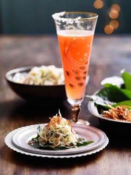 Crab, coconut and kaffir lime on betel leaves