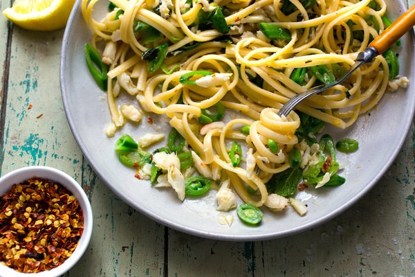 Crab pasta with snap peas and mint