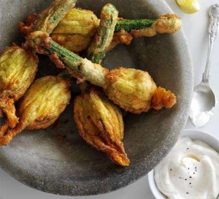 Crab-stuffed courgette flowers