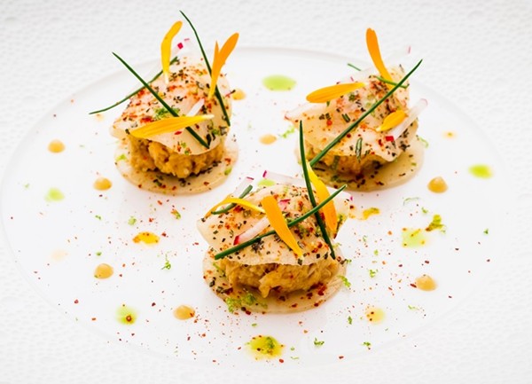 Crabmeat with thin ravioli of turnips, rosemary, sweet and sour dressing