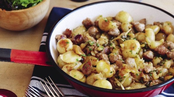 Cracked new potatoes with pork and fennel sausages