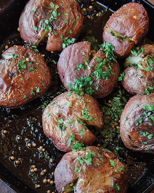 Cracked potatoes tossed with coriander