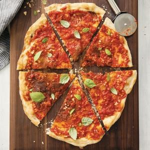 Cracker-thin pizza with garlicky tomato sauce