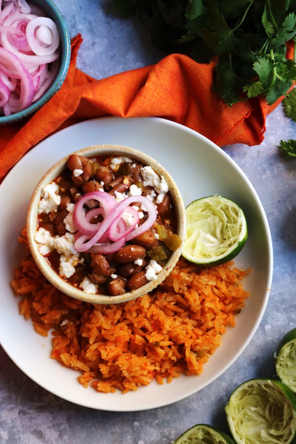Cranberry beans with tequila, green chiles, quick-pickled onions, and Mexican rice