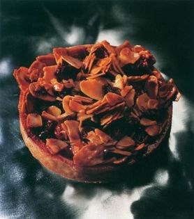 Cranberry, caramel, and almond tart