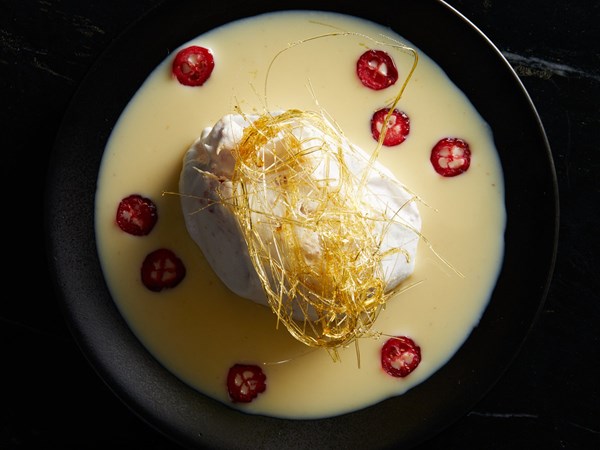 Cranberry ile flottante with nutmeg Anglaise