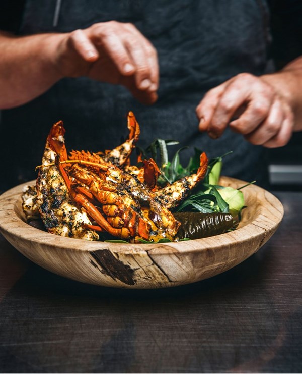 Crayfish grilled on Marlborough salt with black garlic & wild pepper butter