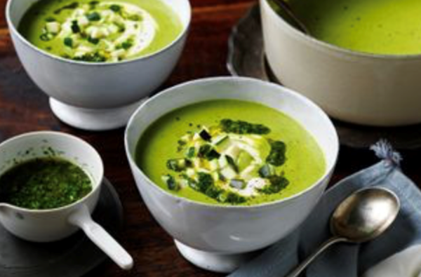 Cream of zucchini soup with lemon, herb and garlic oil