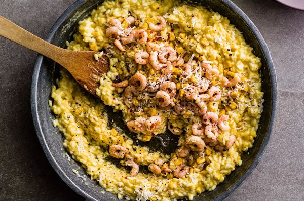 Creamed corn risotto with chilli prawns
