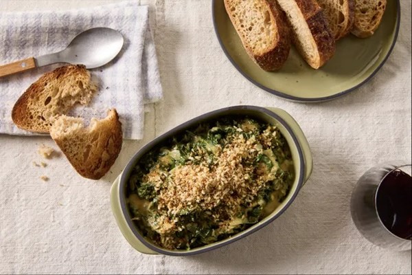 Creamed greens with miso breadcrumbs