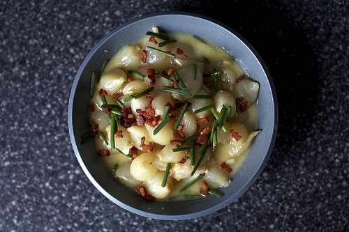 Creamed onions with bacon and chives
