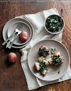 Creamed Swiss chard in goat cheese on baked potatoes