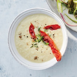 Creamy artichoke soup with crisped prosciutto