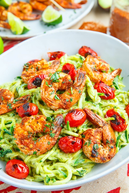 Creamy avocado zucchini noodle pasta with taco lime grilled shrimp