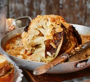 Creamy baked cauliflower with almond crumbs