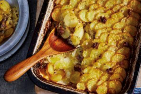 Creamy baked kipfler potatoes with pork sausage [Marcus Papadopoulo]