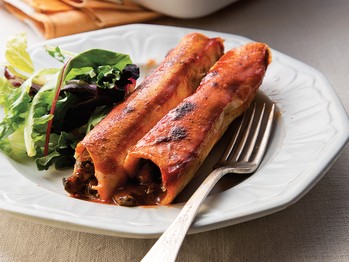 Creamy black bean, mushroom, and zucchini enchiladas