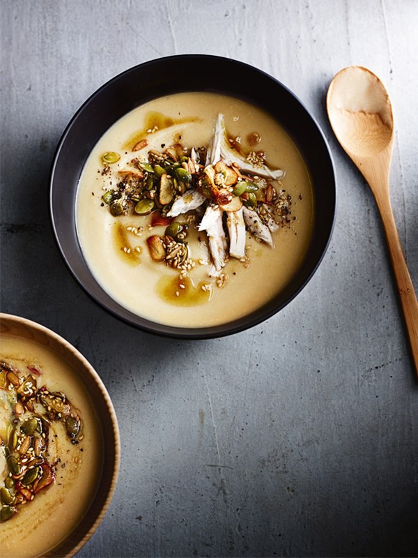 Creamy cauliflower, chicken and split pea soup with spiced seeds