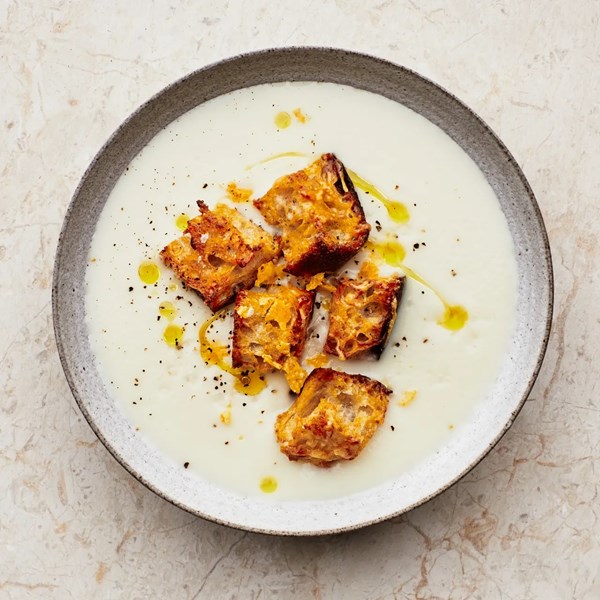 Creamy cauliflower soup with cheesy mustard croutons