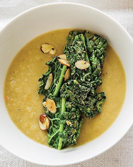 Creamy cauliflower soup with spicy kale & almonds