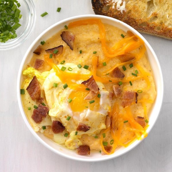 Creamy, cheesy grits with curried poached eggs