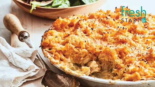 Creamy chicken and thyme pie with kumara Parmesan topping